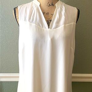 Cream/off white slip on blouse.